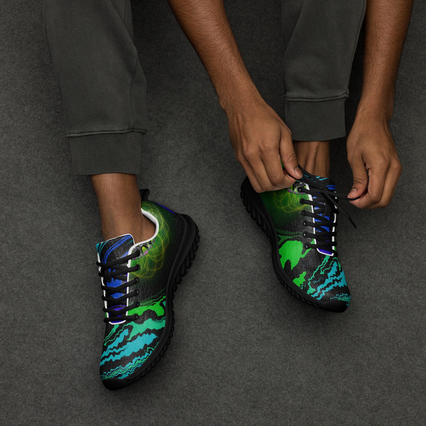 Man putting on Spectral Flow men’s psychedelic athletic shoes